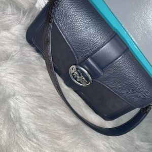 Medium coach handbag.
